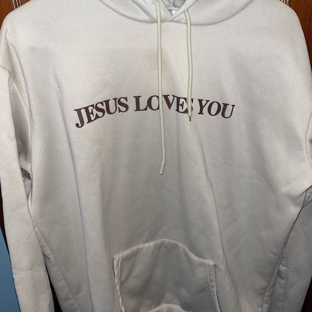 White Hoodie with 'Jesus Loves You' Print